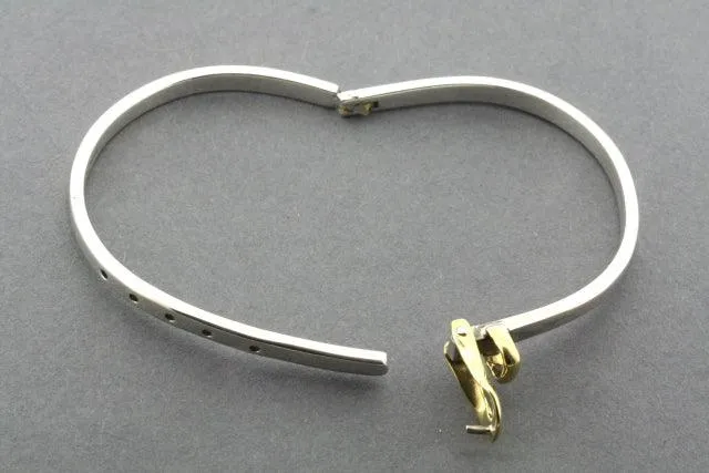 Buckle bangle - sterling silver with brass